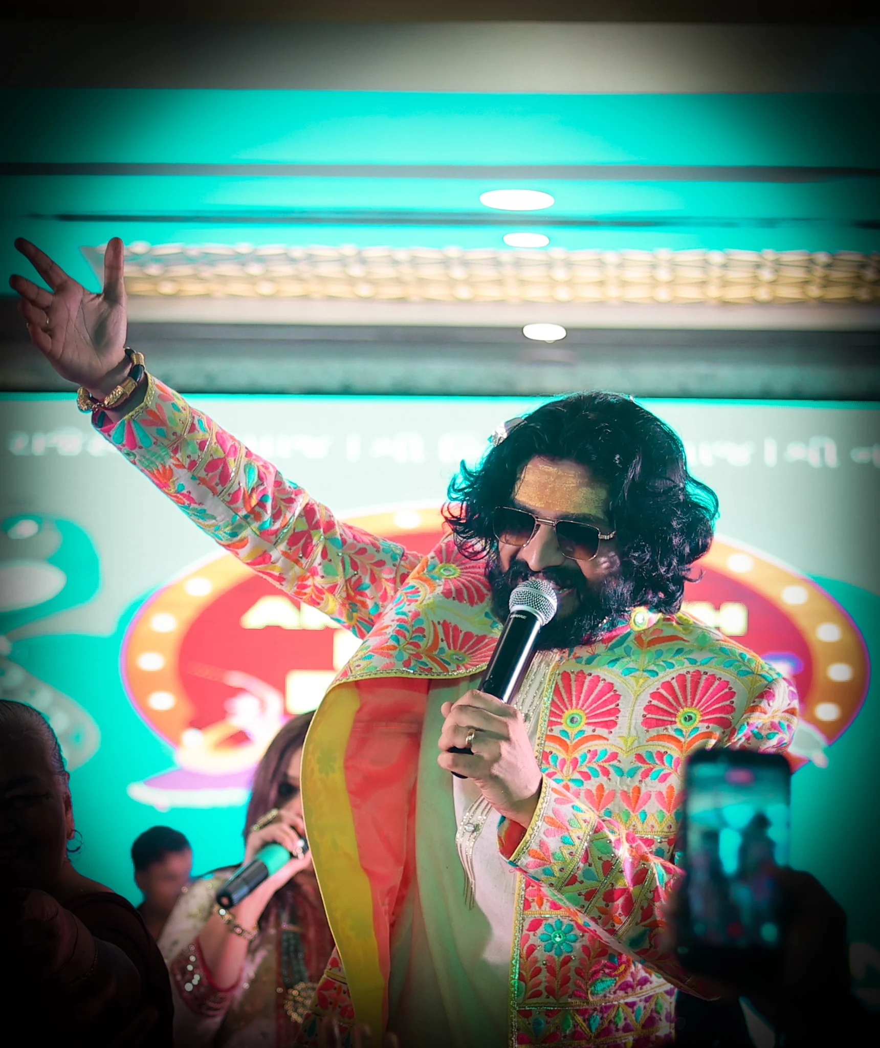 Nirav Barot singing during a live celebration